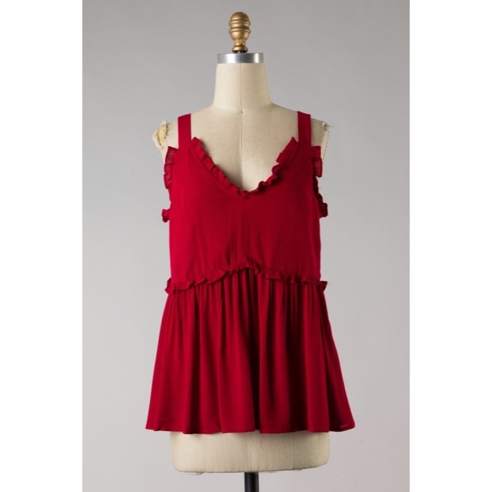 Red sleeveless ruffle trim blouse